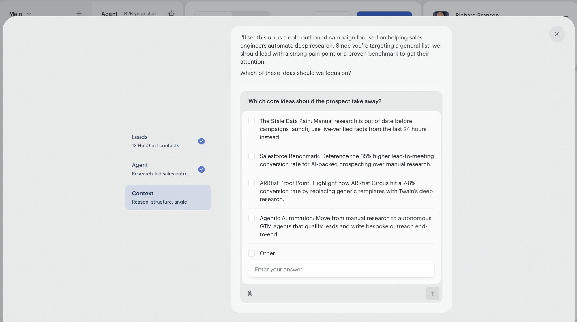 The Campaign Brief 'which core ideas should the prospect take away?' step. Five options are listed with a radio next to each. Options include 'The Stale Data Pain: Manual research is out of date before campaigns launch; use live-verified facts from the last 24 hours instead', 'Salesforce Benchmark: Reference the 35% higher lead-to-meeting conversion rate for AI-backed prospecting over manual research', 'ARRtist Proof Point: Highlight how ARRtist Circus hit a 7-8% conversion rate by replacing generic templates with Twain's deep research', and 'Agentic Automation: Move from manual research to autonomous GTM agents that qualify leads and write bespoke outreach end-to-end'. An 'Other' option with a free-text field is at the bottom.